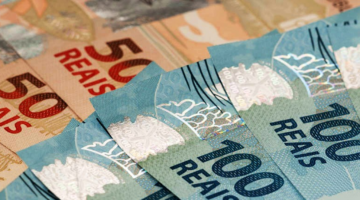 Valores pendentes do auxílio emergencial? Saiba como conferir